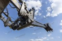 Экскаватор навесной поворотный